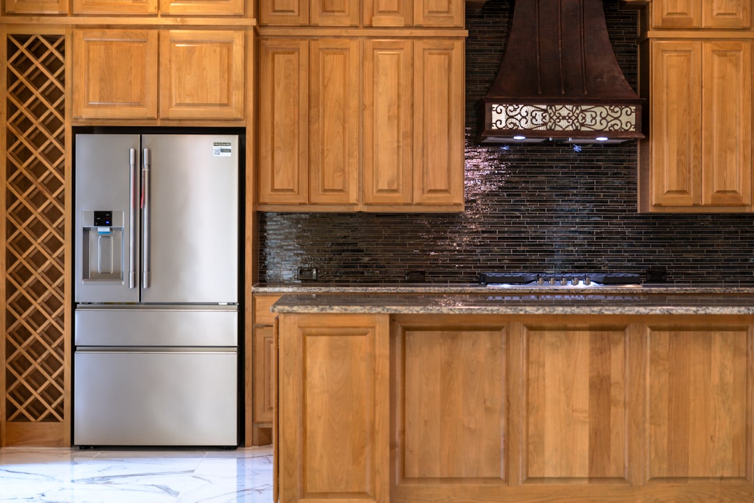 Modern kitchen interior with sleek custom cabinetry, contemporary design aesthetic, professional woodworking craftsmanship