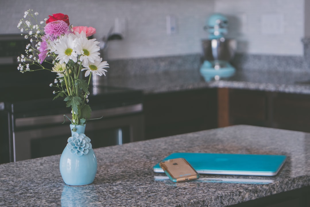 Premium kitchen countertop installation with high-end granite and quartz materials, luxury finishes and professional kitchen design